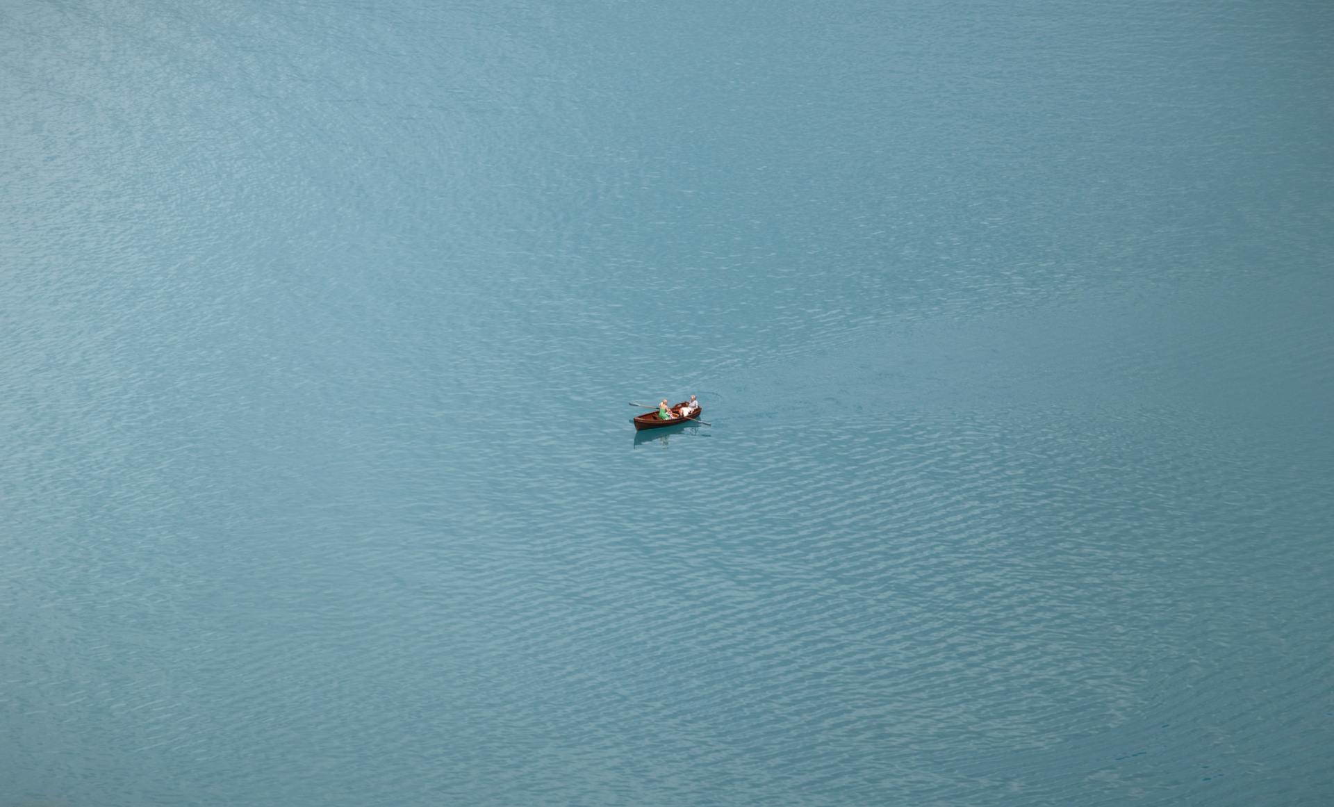 an image of a boat in the middle of a body of water